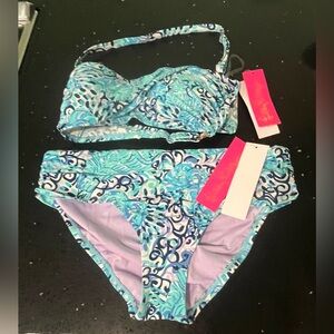 Lilly Pulitzer Blue and Green Patterned Bikini Set
Top size 6 bottom size 8 NWT